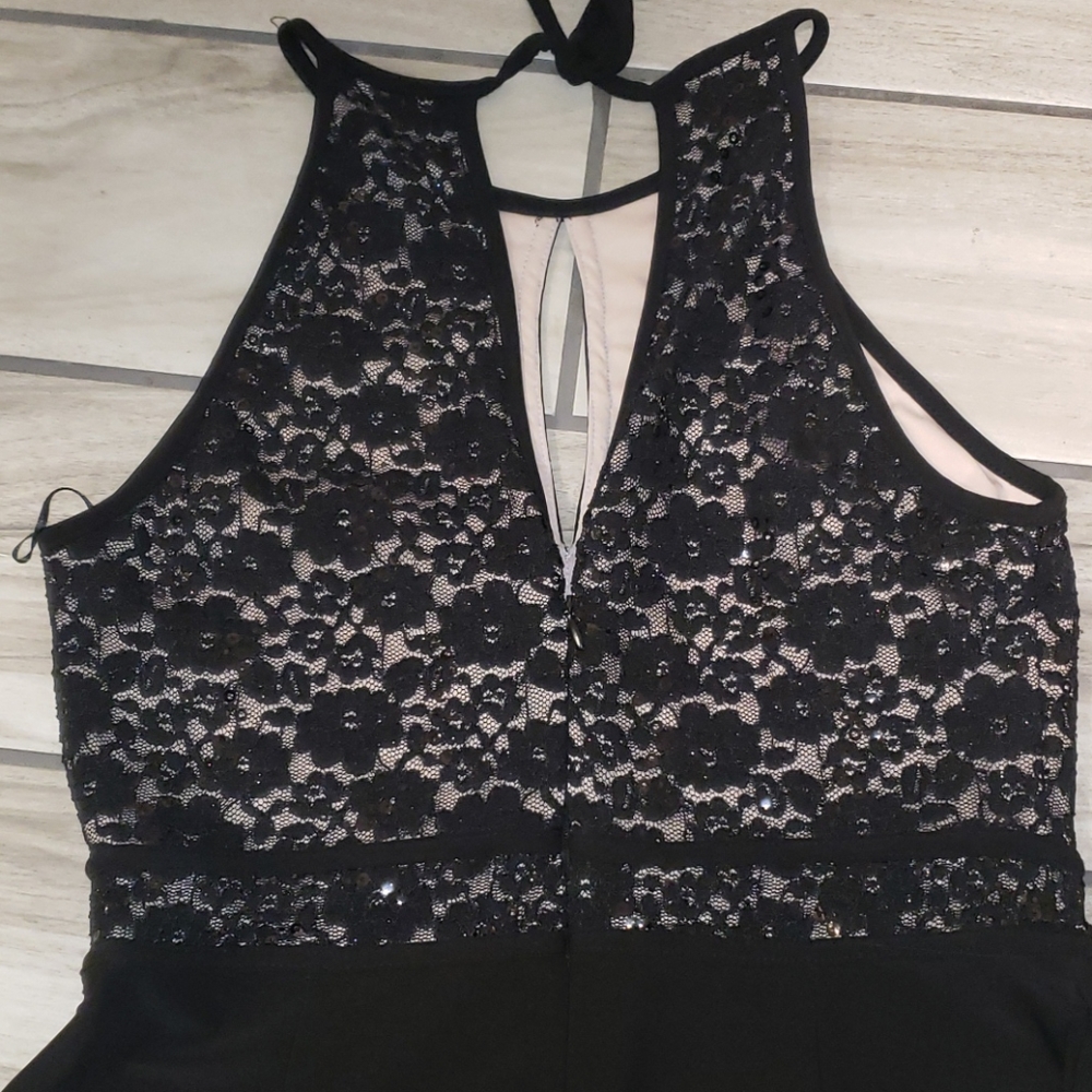 Jumpsuit by: R & M Collection. - Picture 14 of 15